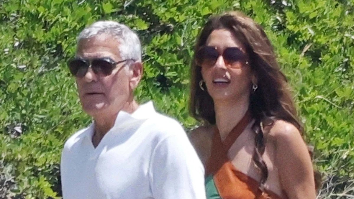 George Clooney's wife Amal looks straight out of the Flintstones in leg-baring tasselled dress