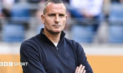 Nicky Hayen watches on from the sidelines during his time as manager of Genk