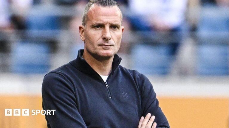 Nicky Hayen watches on from the sidelines during his time as manager of Genk