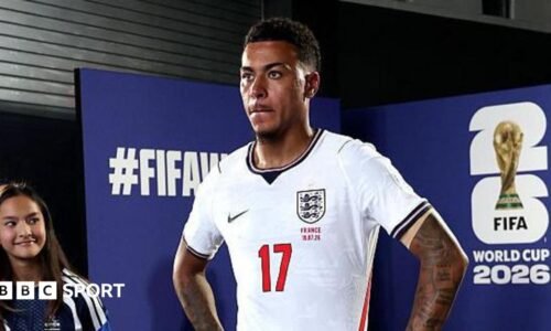 Morgan Rogers stood with his hands on his hips before playing for England against France