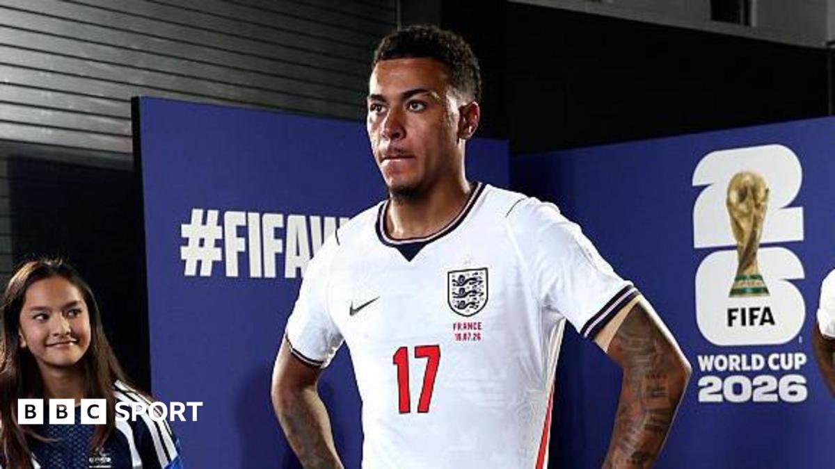 Morgan Rogers stood with his hands on his hips before playing for England against France