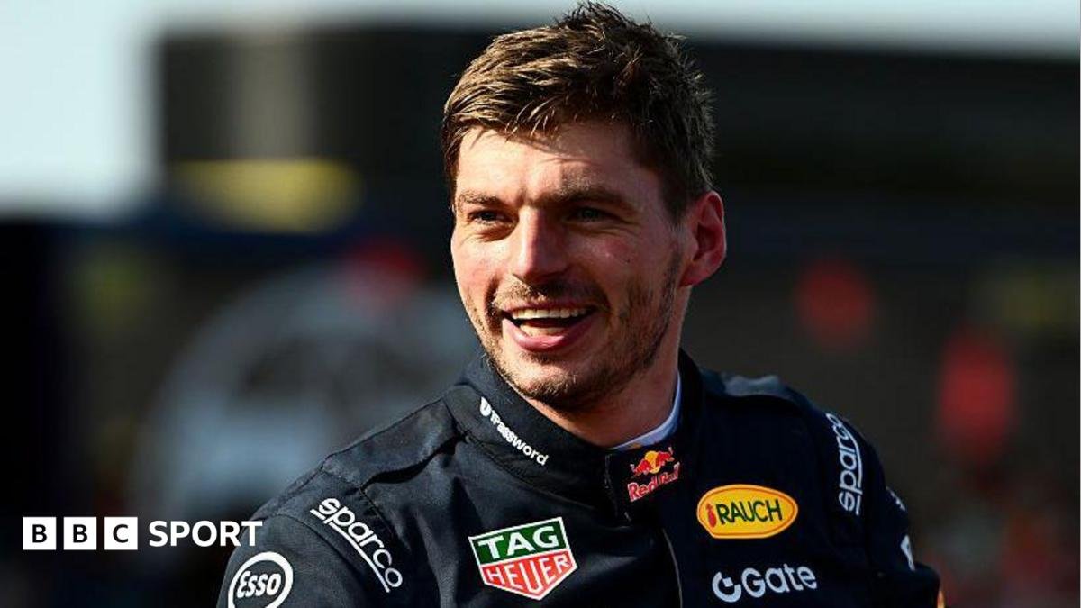 Max Verstappen in a black Red Bull racing outfit