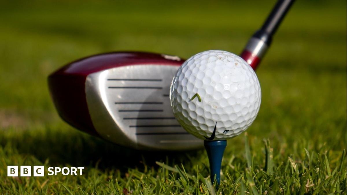Picture showing golf driver next to a golf ball on a tee
